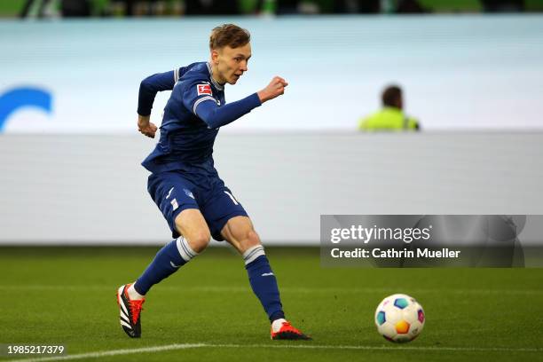 Maximilian Beier of TSG 1899 Hoffenheim scores his team's first goal during the Bundesliga match between VfL Wolfsburg and TSG Hoffenheim at...