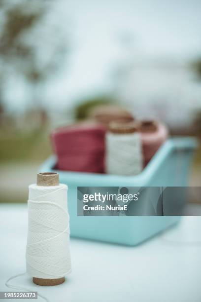 close-up of a box with skeins of yarn on a table - nuria stock pictures, royalty-free photos & images