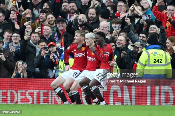 Alejandro Garnacho of Manchester United celebrates with Rasmus Hojlund and Kobbie Mainoo of Manchester United after scoring his team's second goal...