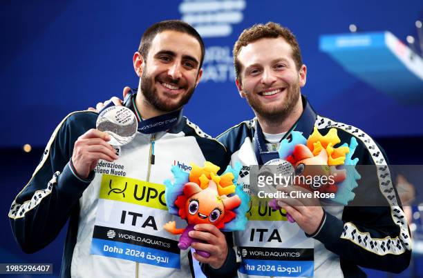 Silver Medalists, Lorenzo Marsaglia and Giovanni Tocci of Team Italy pose with their medals during the Medal Ceremony after the Men's Synchronized 3m...