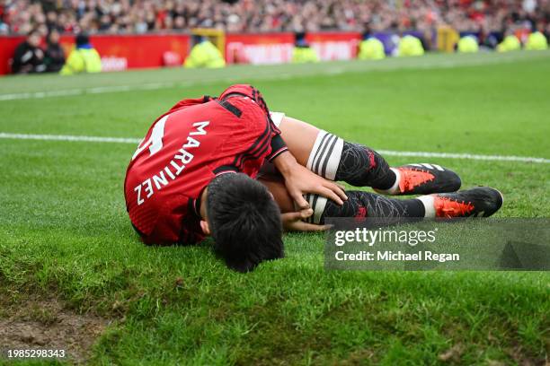 Lisandro Martinez of Manchester United goes down with an injury during the Premier League match between Manchester United and West Ham United at Old...