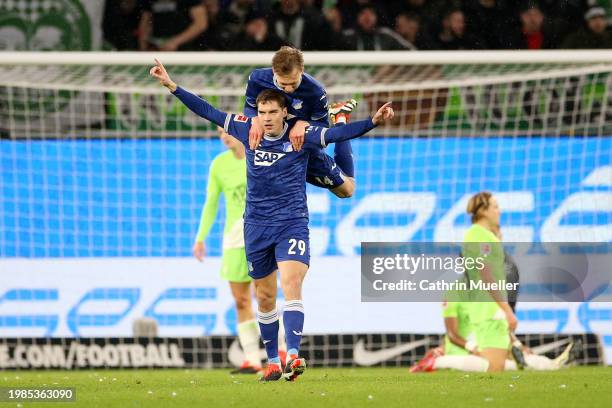 Robert Skov and Maximilian Beier of TSG 1899 Hoffenheim celebrate after Grischa Proemel of TSG 1899 Hoffenheim scores his team's second goal during...