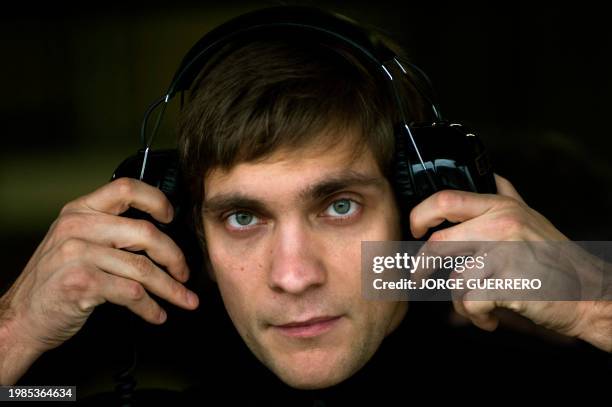 Lotus Renault GP's Russian Vitaly Petrov takes part in a training session at Jerez racetrack, on February 13, 2011 in Jerez.AFP PHOTO / JORGE...