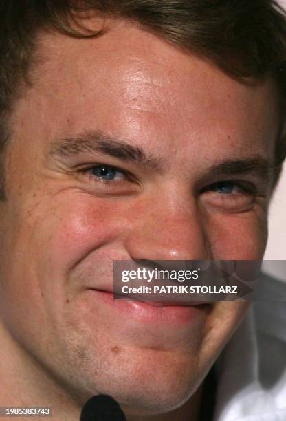 Germany's national football team goalkeeper Manuel Neuer smiles during a press conference in Cologne, western Germany on September 6, 2010. The...