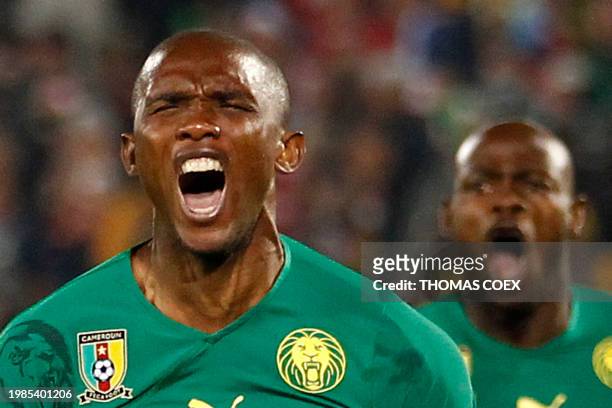 Cameroon's striker Samuel Eto'o celebrates after scoring the opening goal during the Group E first round 2010 World Cup football match Cameroon vs....