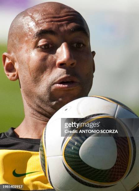 Brazil's defender Luisao stops the ball during a training session at Randburg High School in Johannesburg, on May 29, 2010 ahead of the 2010 FIFA...
