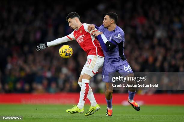 Gabriel Martinelli of Arsenal and Trent Alexander-Arnold of Liverpool battle for possession during the Premier League match between Arsenal FC and...