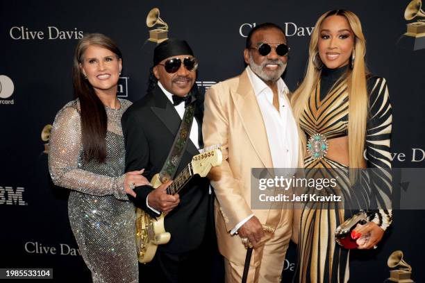 Tracy Isley, Ernie Isley and Ronald Isley of the Isley Brothers, and Kandy Johnson Isley attend the 66th GRAMMY Awards Pre-GRAMMY Gala & GRAMMY...