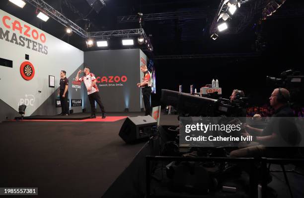 The television cameras film as Damon Heta throws in the match against Dimitri van den Burgh during Day Three of the 2024 PDC Cazoo Masters Darts at...