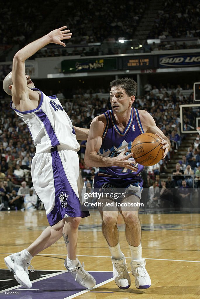 John Stockton goes to the basket