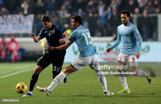 Aleksey Miranchuk of Atalanta BC is challenged by Alessio Romagnoli of SS Lazio during the Serie A TIM match between Atalanta BC and SS Lazio at...