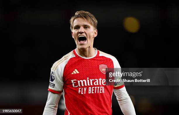 Martin Odegaard of Arsenal celebrates after the team's victory in the Premier League match between Arsenal FC and Liverpool FC at Emirates Stadium on...