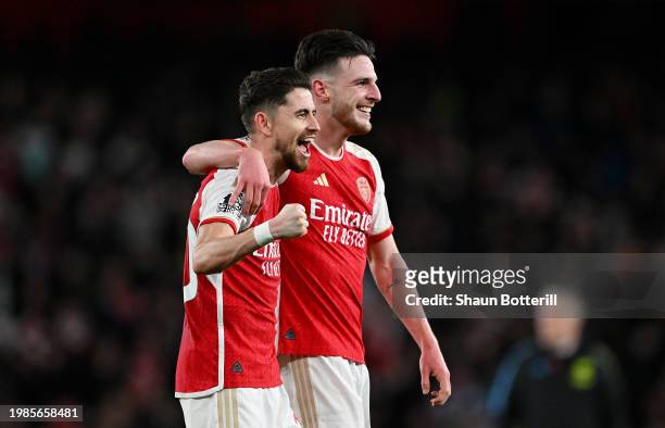 Jorginho and Declan Rice of Arsenal celebrate after the team's victory in the Premier League match between Arsenal FC and Liverpool FC at Emirates...
