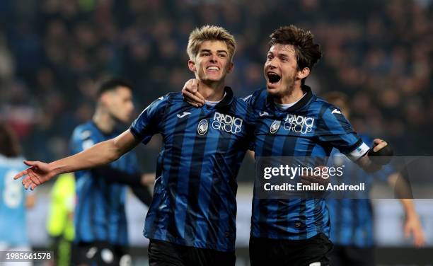 Charles De Ketelaere of Atalanta BC celebrates with Marten de Roon of Atalanta BC after scoring his team's third goal during the Serie A TIM match...