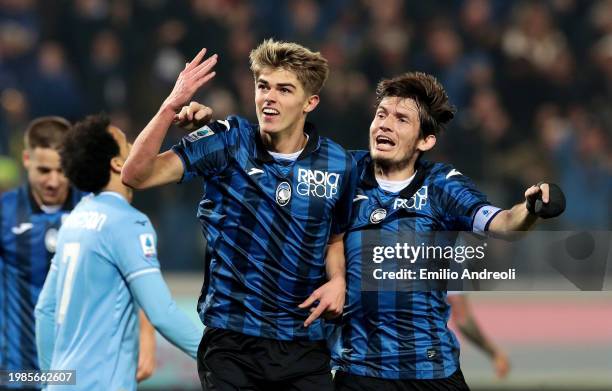 Charles De Ketelaere of Atalanta BC celebrates with Marten de Roon of Atalanta BC after scoring his team's third goal during the Serie A TIM match...