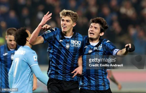 Charles De Ketelaere of Atalanta BC celebrates with Marten de Roon of Atalanta BC after scoring his team's third goal during the Serie A TIM match...