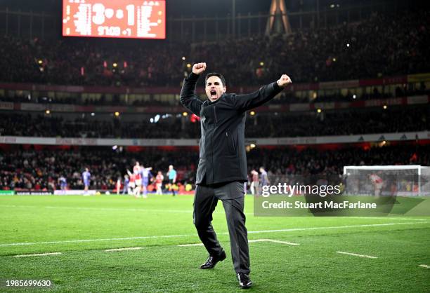 Mikel Arteta, Manager of Arsenal, celebrates after the team's victory in the Premier League match between Arsenal FC and Liverpool FC at Emirates...