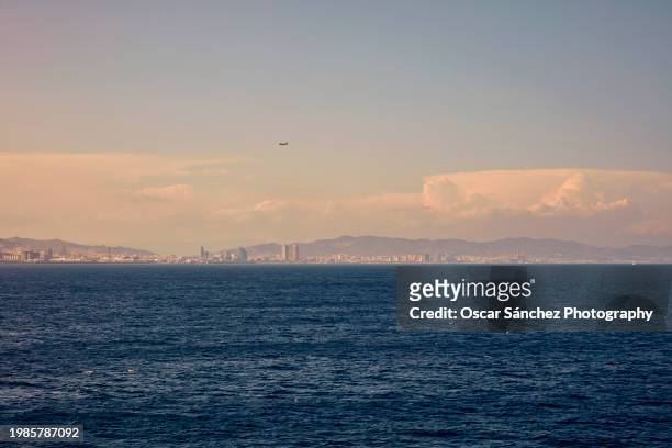barcelona from the sea - torre agbar stock pictures, royalty-free photos & images