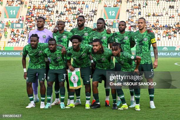 Nigeria's players pose ahead of the Africa Cup of Nations 2024 semi-final football match between Nigeria and South Africa at the Stade de la Paix in...