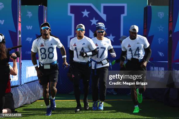 CeeDee Lamb of the Dallas Cowboys, Amon-Ra St. Brown of the Detroit Lions, Puka Nacua of the Los Angeles Rams, and DK Metcalf of the Seattle Seahawks...