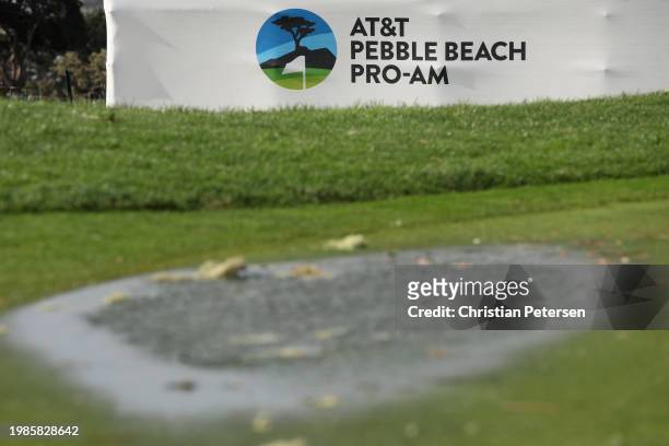 Water puddles are seen on course greens during the delayed final round start the AT&T Pebble Beach Pro-Am at Pebble Beach Golf Links on February 04,...