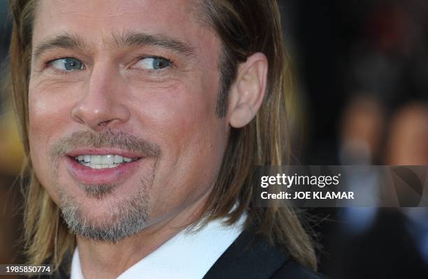 Actor Brad Pitt arrives on the red carpet for the 84th Annual Academy Awards on February 26, 2012 in Hollywood, California. AFP PHOTO Joe KLAMAR