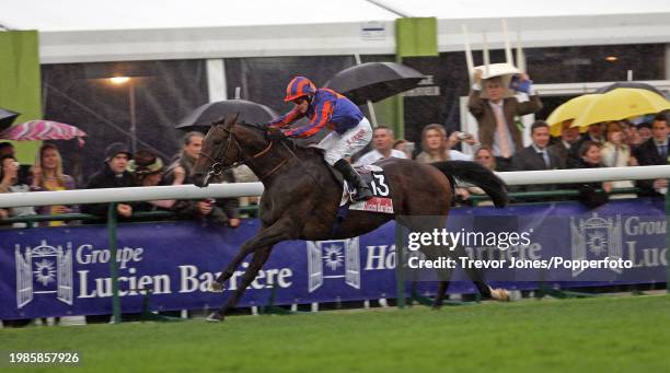 Irish Jockey Kieren Fallon riding Hurricane Run winning the Prix de l'Arc de Triomphe at Longchamp, 2nd October 2005.