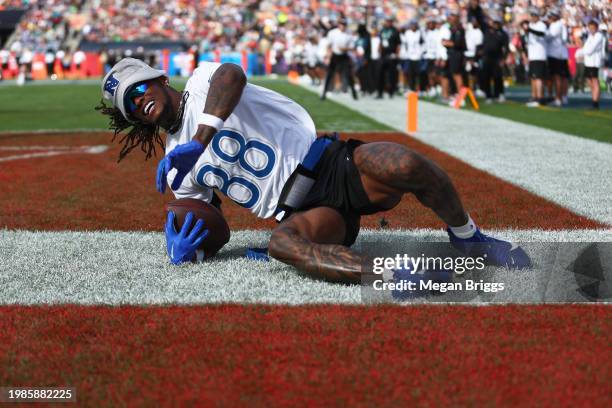 CeeDee Lamb of the Dallas Cowboys and NFC catches a pass for a touchdown during the first quarter of the 2024 NFL Pro Bowl Games at Camping World...