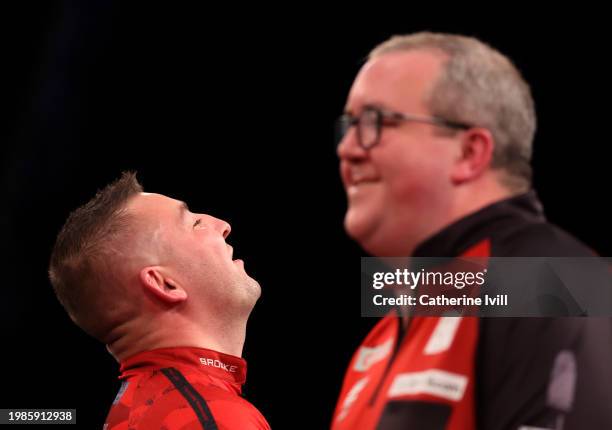 Nathan Aspinall reacts during the semi-final match with Stephen Bunting on Day Three of the 2024 PDC Cazoo Masters Darts at Marshall Arena on...