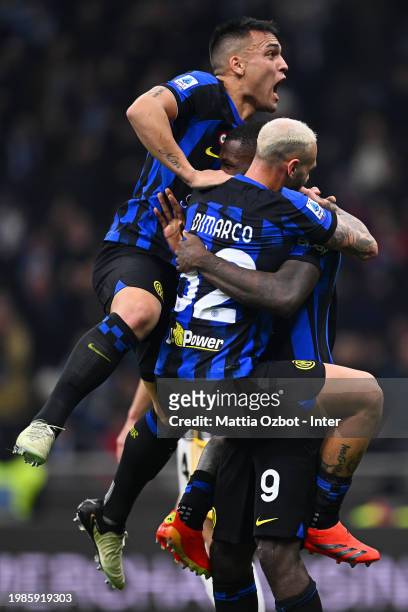 Lautaro Martinez, Marcus Thuram and Federico Dimarco of FC Internazionale celebrate their team's first goal during the Serie A TIM match between FC...