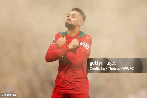 Matheus Cunha of Wolverhampton Wanderers celebrates after scoring his team's third goal during the Premier League match between Chelsea FC and...