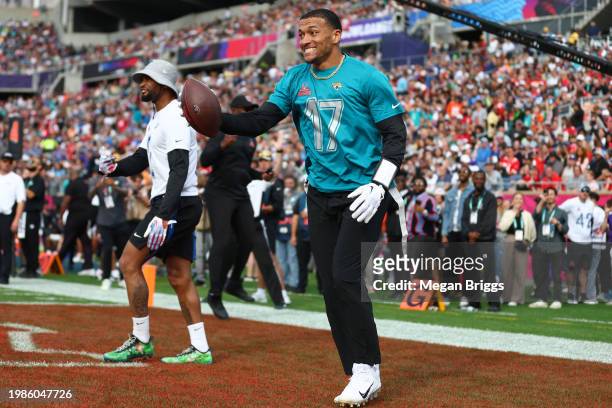 Evan Engram of the Jacksonville Jaguars and AFC reacts after scoring a touchdown during the first half of the 2024 NFL Pro Bowl Games at Camping...