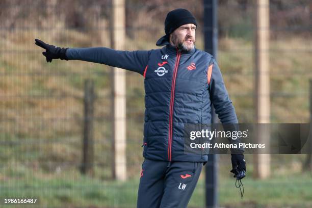 Manager Luke Williams gives instructions during the Swansea City Training Session at The Fairwood Training Ground on February 07, 2024 in Swansea,...