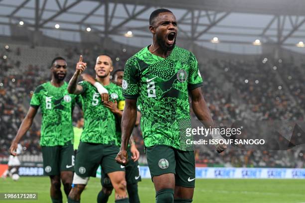 Nigeria's midfielder Frank Onyeka celebrates the team's first goal during the Africa Cup of Nations 2024 semi-final football match between Nigeria...