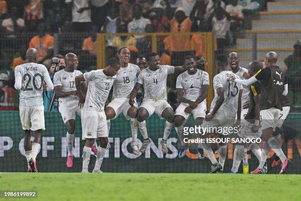 South Africa's players celebrate after scoring their team's first goal from the penalty spot during the Africa Cup of Nations 2024 semi-final...