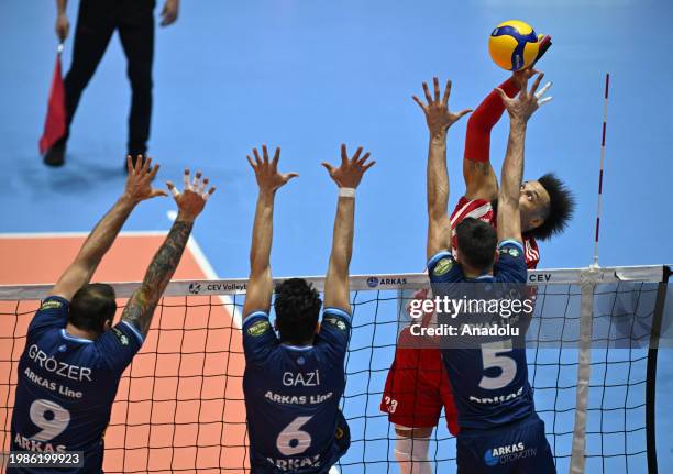 Ramazan Efe Mandiraci , Ertugrul Gazi Metin and Gyorgy Grozer of Arkas Spor in action against Salvador Hildalgo Olivia of Olympiakos during the CEV...