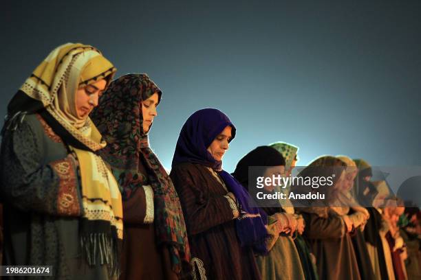 Women perform night prayers at the Hazratbal shrine on the occasion of Lailat al Miraj or Shab-e-Meraj in India-administered state of Jammu and...