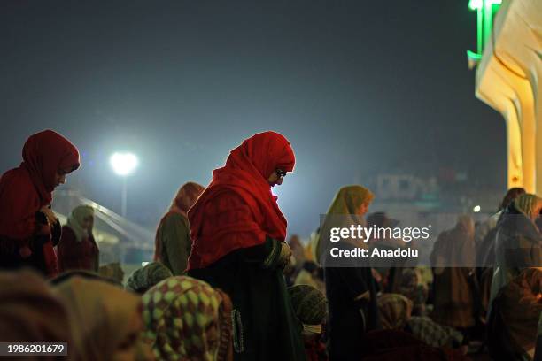 Woman offer night prayers at the Hazratbal shrine on the occasion of Lailat al Miraj or Shab-e-Meraj in India-administered state of Jammu and Kashmir...