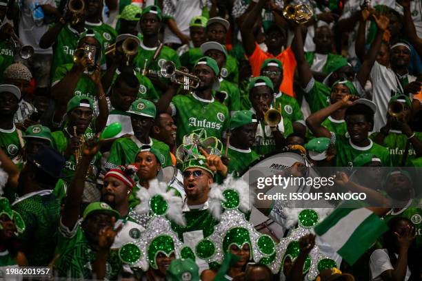 Nigeria's supporters celebrate the victory at the end of the Africa Cup of Nations 2024 semi-final football match between Nigeria and South Africa at...