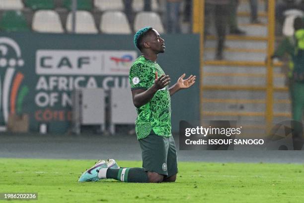 Nigeria's defender Kenneth Omeruo celebrates the victory at the end of the Africa Cup of Nations 2024 semi-final football match between Nigeria and...