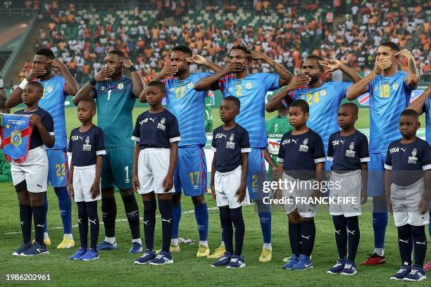 Congo's players gesture ahead of the Africa Cup of Nations 2024 semi-final football match between Ivory Coast and Democratic Repuplic of Congo at...