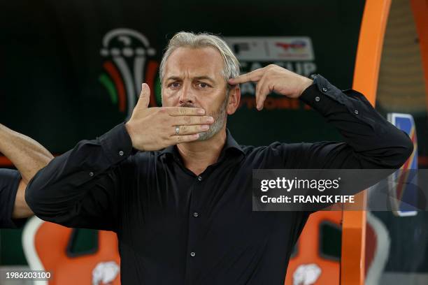 Congo's French head coach Sebastien Desabre gestures ahead of the Africa Cup of Nations 2024 semi-final football match between Ivory Coast and...
