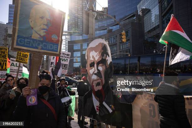 Pro-Palestinian demonstrators at Columbus Circle in New York, US, on Wednesday, Feb. 7, 2024. US President Joe Biden will attend a trio of...