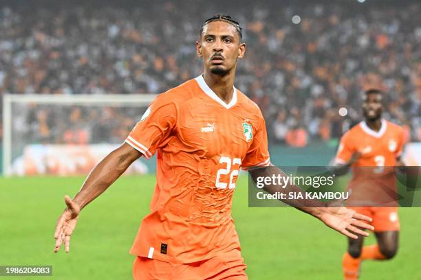 Ivory Coast's forward Sebastien Haller celebrates scoring his team's first goal during the Africa Cup of Nations 2024 semi-final football match...