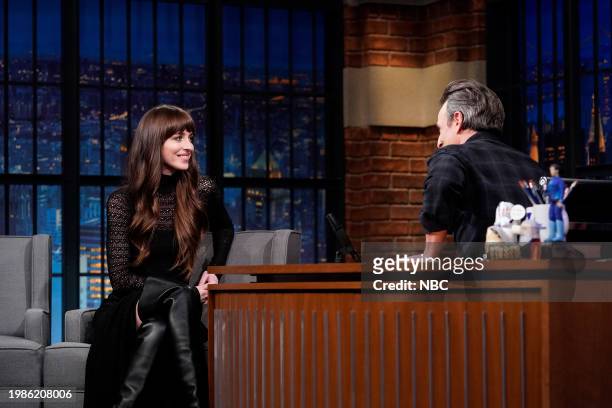 Episode 1482 -- Pictured: Actress Dakota Johnson during an interview with host Seth Meyers on February 7, 2024 --
