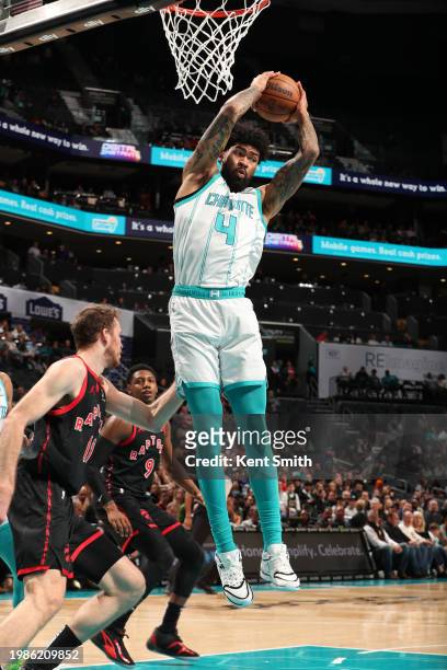 February 7: Nick Richards of the Charlotte Hornets rebounds the ball during the game against the Toronto Raptors on February 7, 2024 at Spectrum...