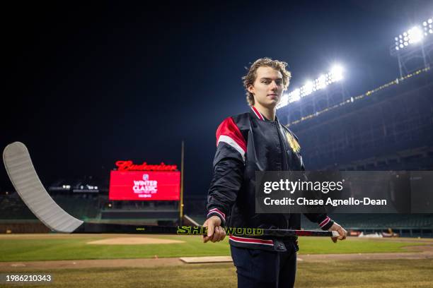 Connor Bedard of the Chicago Blackhawks poses for a portrait after announcing that the 2025 Discover NHL Winter Classic will feature the Chicago...