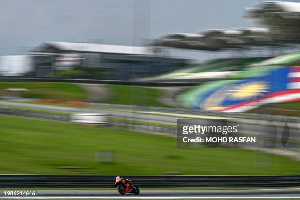 Red Bull KTM Factory Racing South African rider Brad Binder steers his bike during the third day of the pre-season MotoGP test at the Sepang...