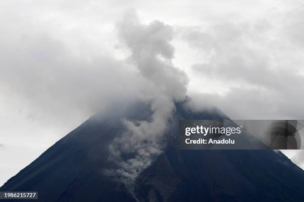 The activity of Mount Merapi release incandescent lava and hot clouds during foggy weather in in Sleman district of Yogyakarta, Indonesia on February...