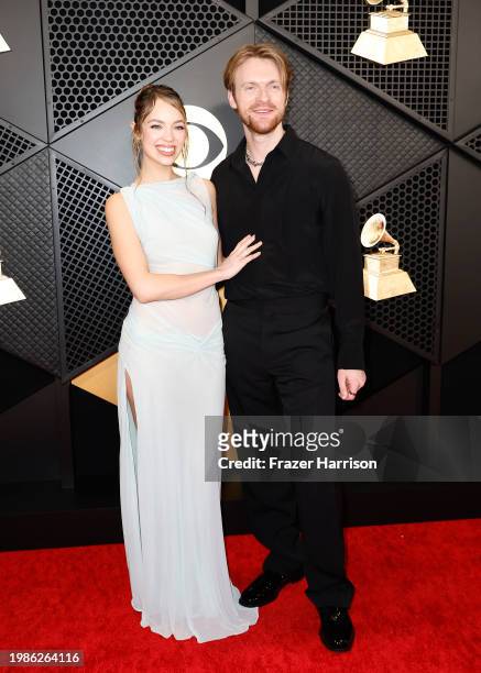Claudia Sulewski and FINNEAS attend the 66th GRAMMY Awards at Crypto.com Arena on February 04, 2024 in Los Angeles, California.